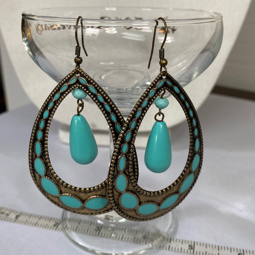 Large open tear drop hoops with turquoise blue inlay
